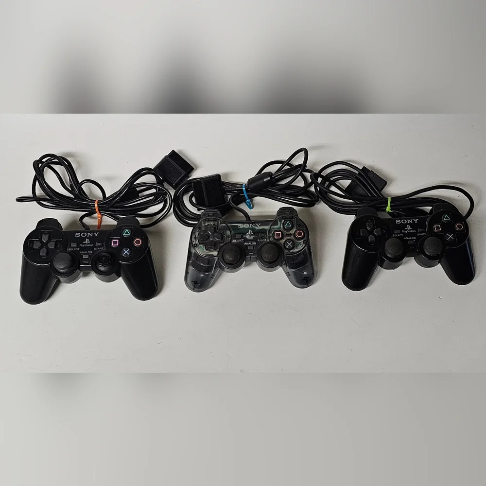 PlayStation 2 DualShock 2 Controllers Lot of 3 Black, 1 Transparent Black